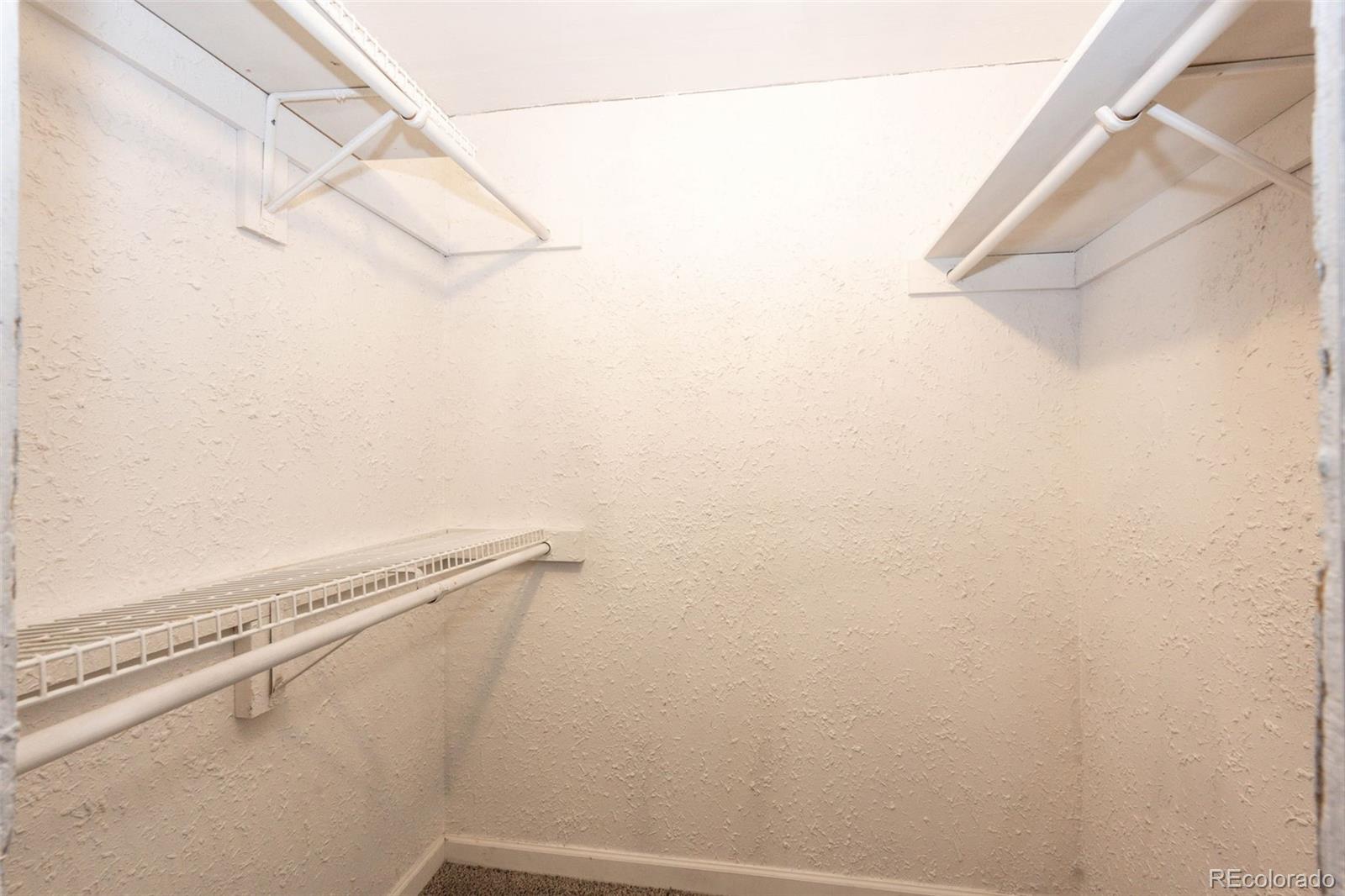 18538 East Whitaker Circle, Unit E Aurora, CO 80015 - Photo 24 of 31 a close up of a shower