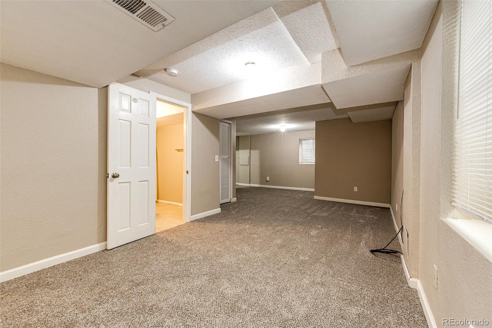 18538 East Whitaker Circle, Unit E Aurora, CO 80015 - Photo 25 of 31 a view of an empty room