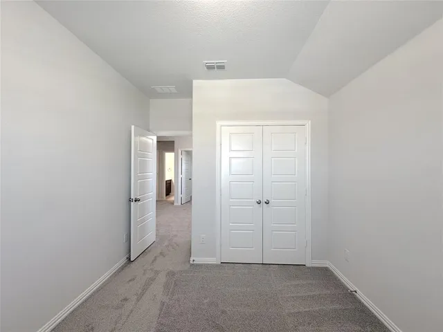 an empty room with closet