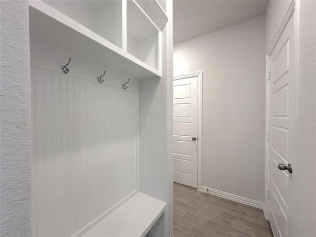a bathroom with a sink a mirror and toilet
