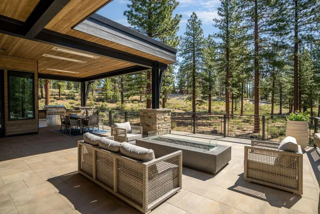 a view of a patio with couches and chairs