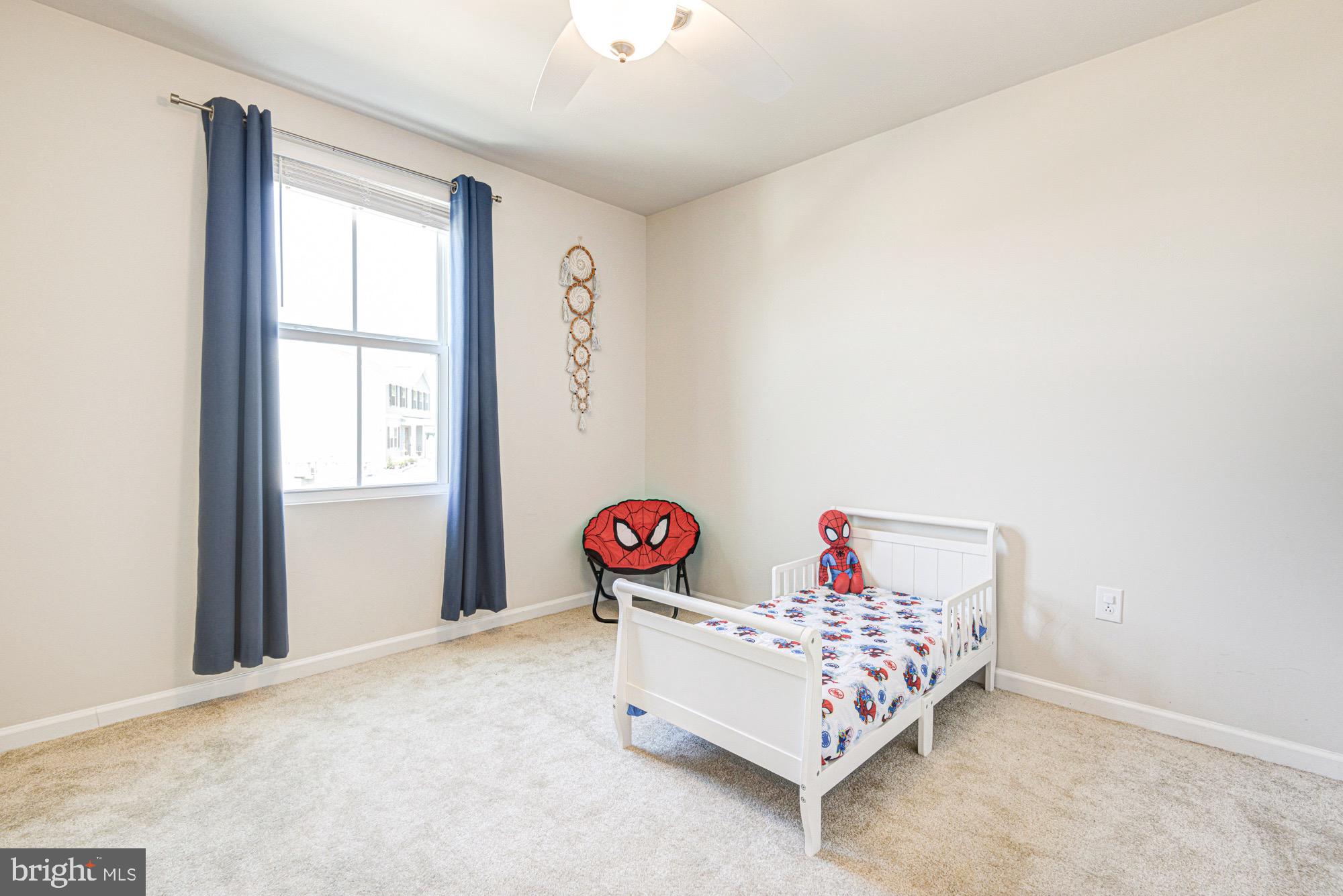 293 Sedimentary Rock Road Dover, DE 19904 - Photo 33 of 36 a bedroom with bed and a window