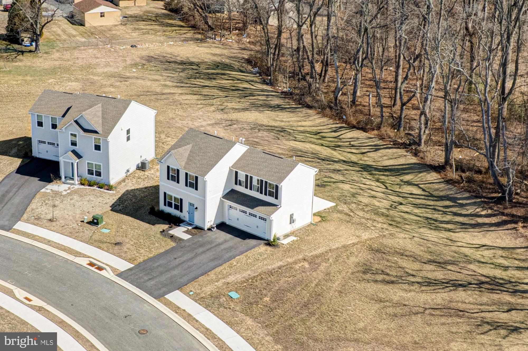 293 Sedimentary Rock Road Dover, DE 19904 - Photo 4 of 36 a view of a terrace with chairs