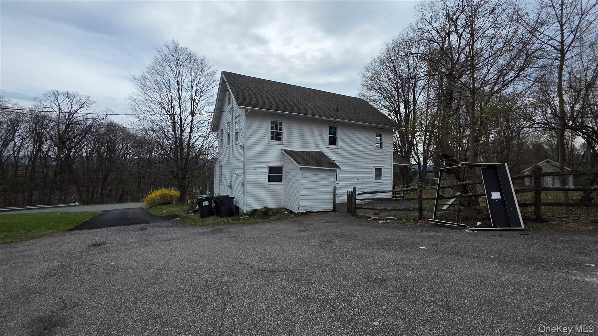 7 Schunnemunk Road Highland Mills, NY 10930 - Photo 25 of 27 a view of a house with backyard and trees