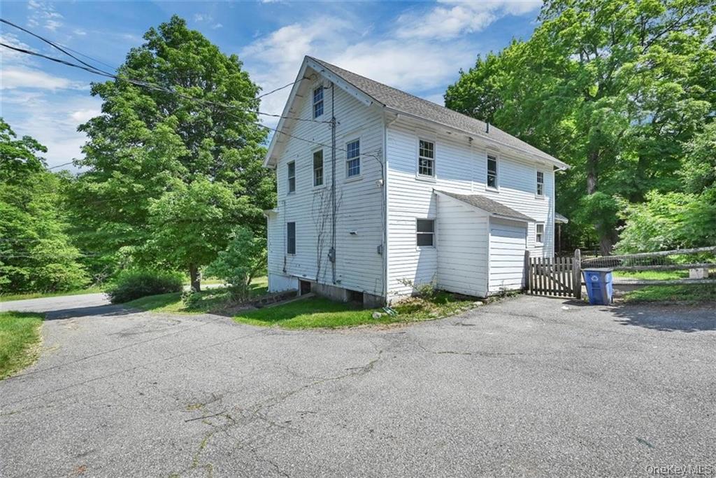 7 Schunnemunk Road Highland Mills, NY 10930 - Photo 27 of 27 a view of a house with a street and a garage