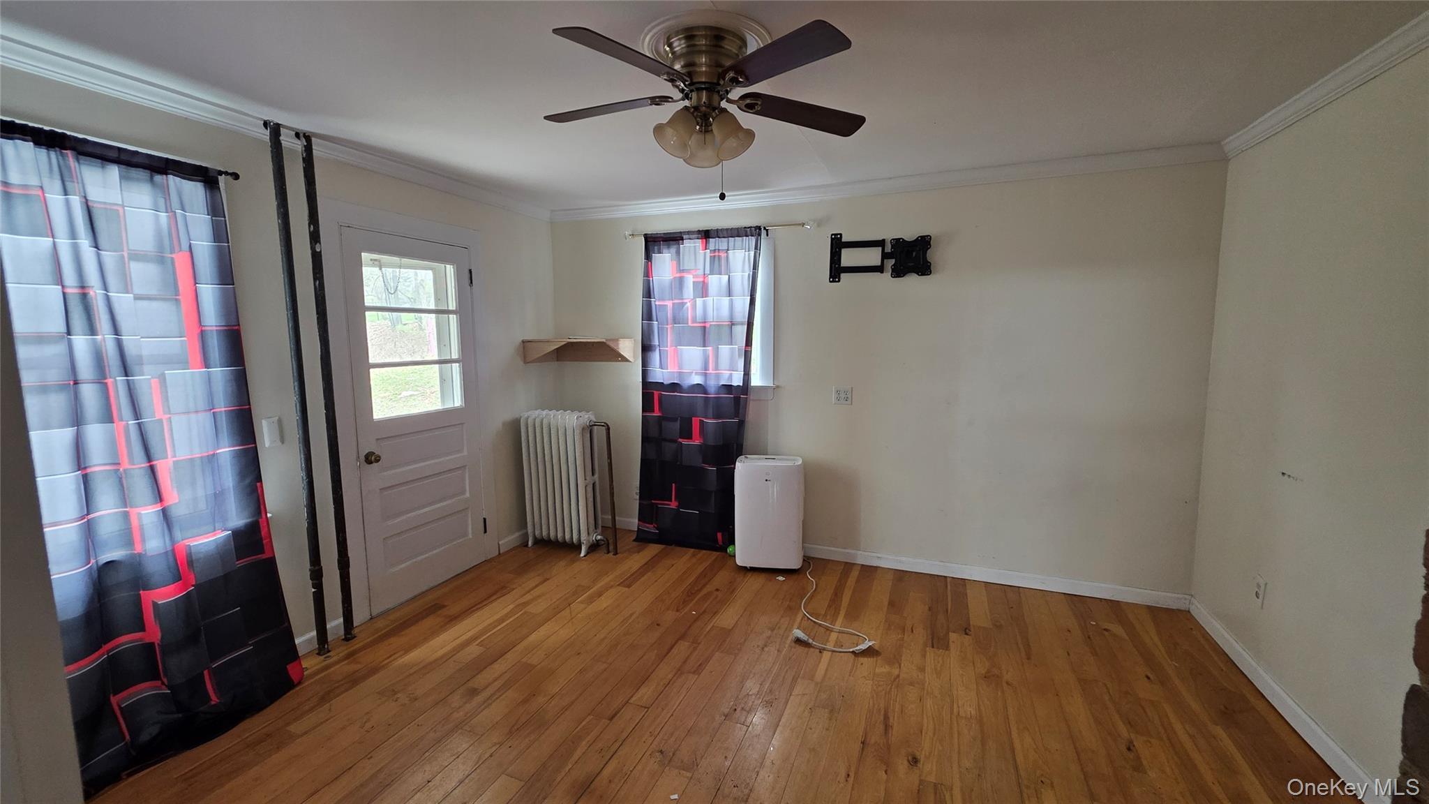 7 Schunnemunk Road Highland Mills, NY 10930 - Photo 8 of 27 a view of a livingroom with furniture and hardwood floor