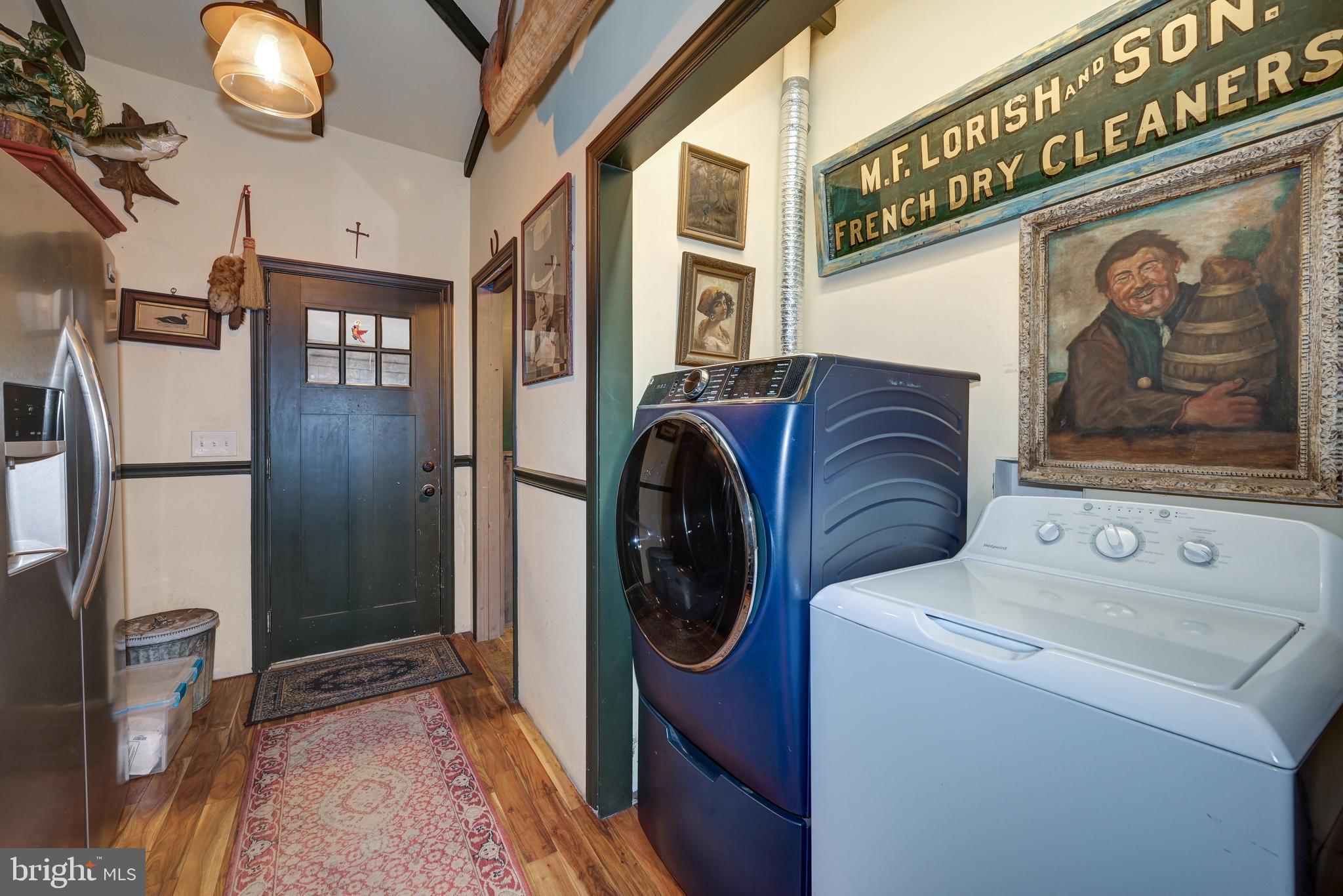 705 Woodlane Road Beverly, NJ 08010 - Photo 34 of 65 a utility room with dryer and washer