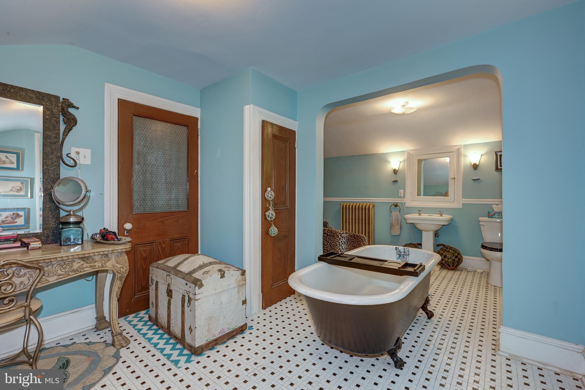 705 Woodlane Road Beverly, NJ 08010 - Photo 45 of 65 a living room with furniture and a wooden floor