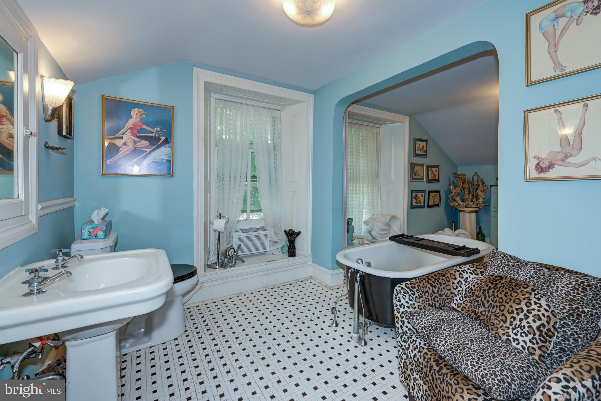 705 Woodlane Road Beverly, NJ 08010 - Photo 46 of 65 a bathroom with a sink and a mirror