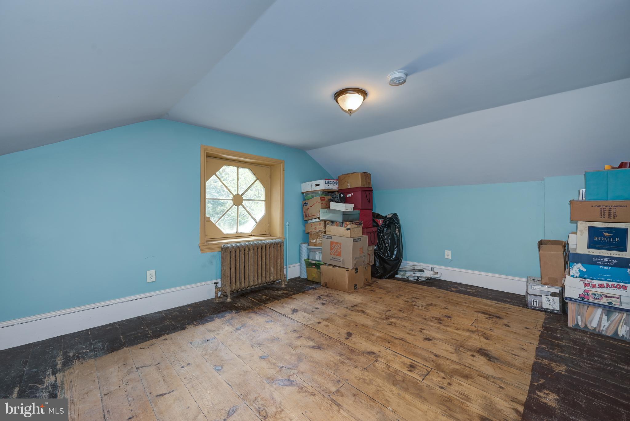 705 Woodlane Road Beverly, NJ 08010 - Photo 51 of 65 a bed room with a bed and a window