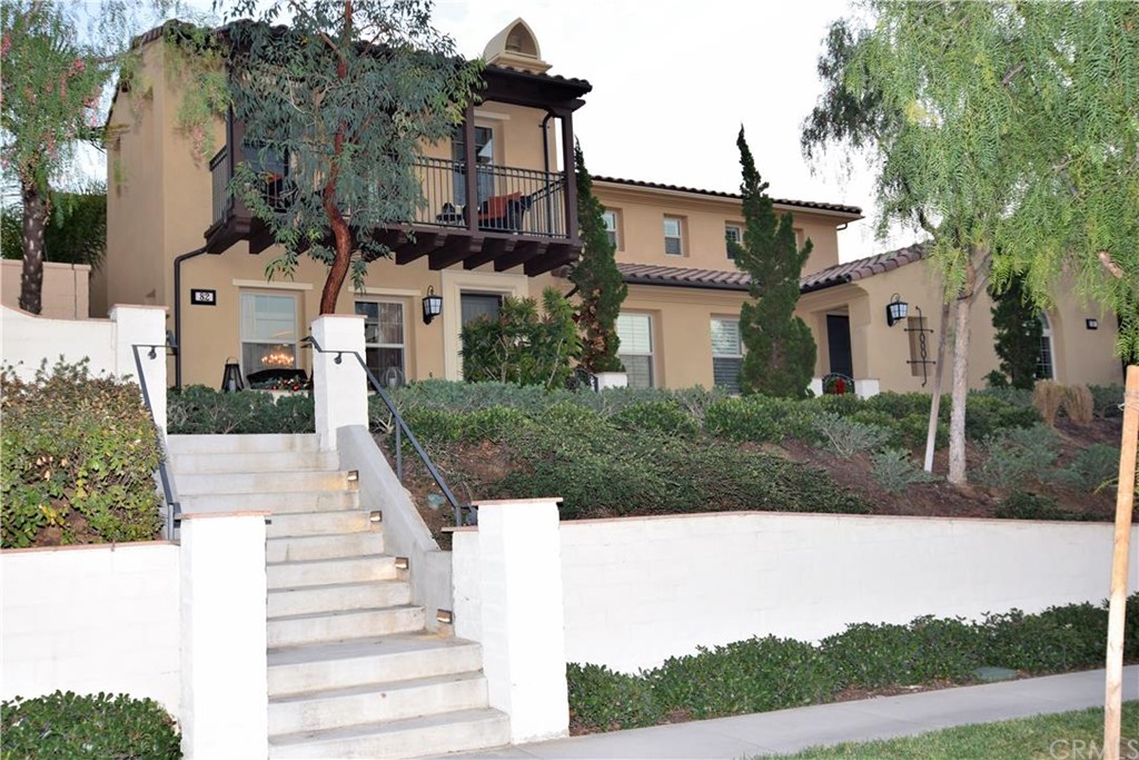 82 Ranchland Irvine, CA 92618 - Photo 1 of 1 Rare and unique raised entry level, creating a sense of privacy.
