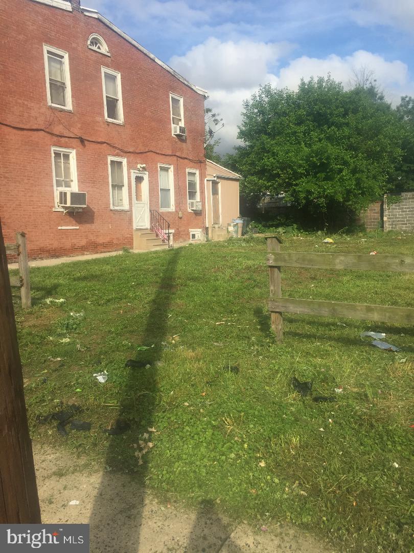 4675 Hawthorne Street Philadelphia, PA 19124 - Photo 5 of 5 a view of a big yard of front a house