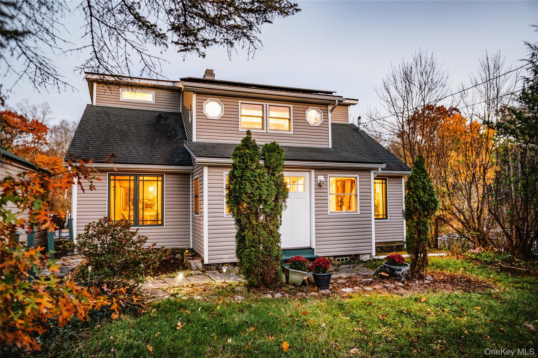 165 High Falls Road Extension Catskill, NY 12414 - Photo 1 of 28 a front view of house and yard with trees