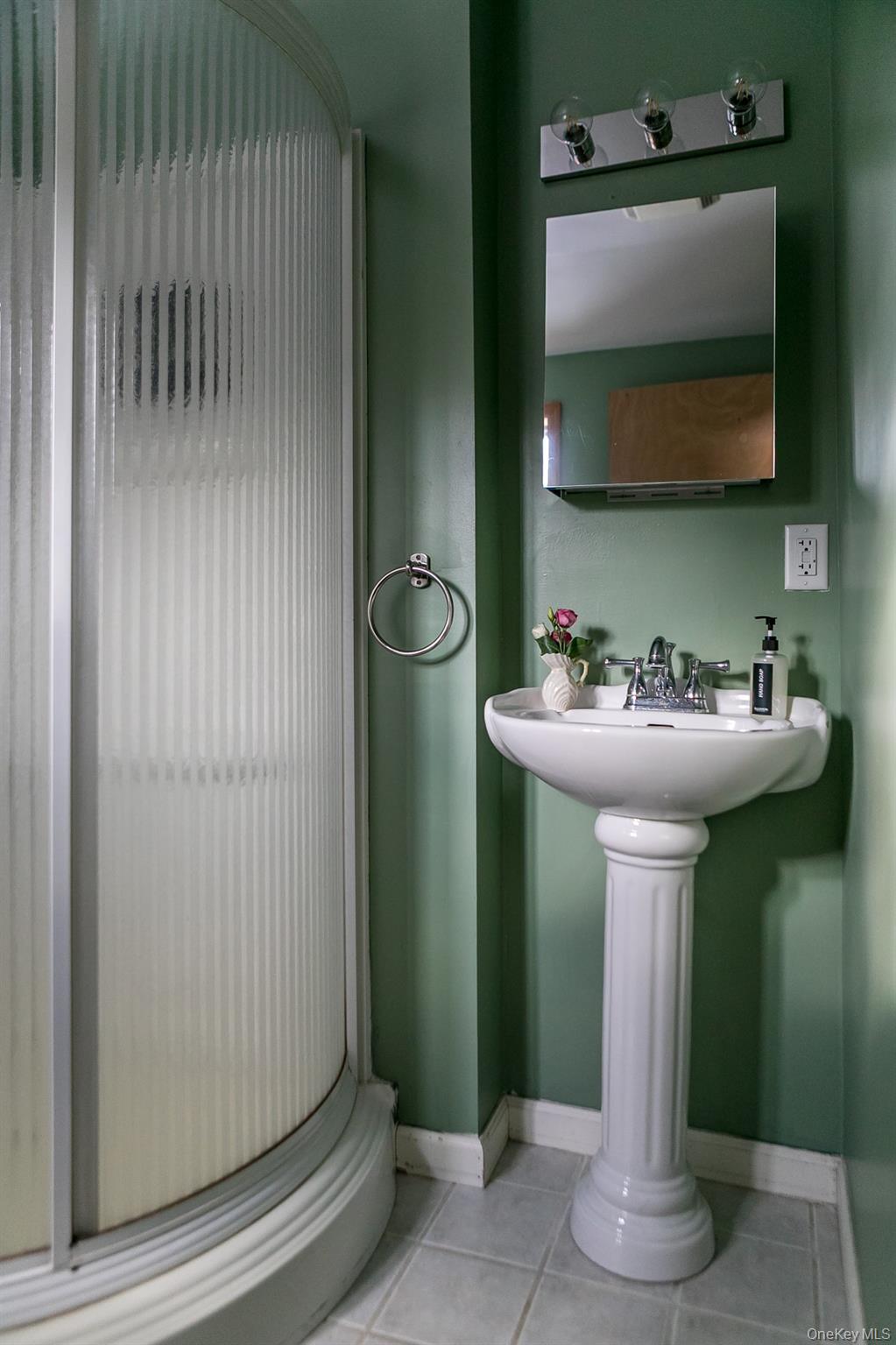 165 High Falls Road Extension Catskill, NY 12414 - Photo 16 of 28 a bathroom with a sink and a mirror