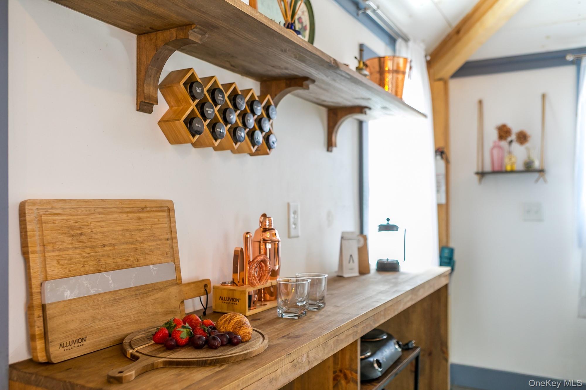 165 High Falls Road Extension Catskill, NY 12414 - Photo 22 of 28 a table with wine bottles and glasses on it