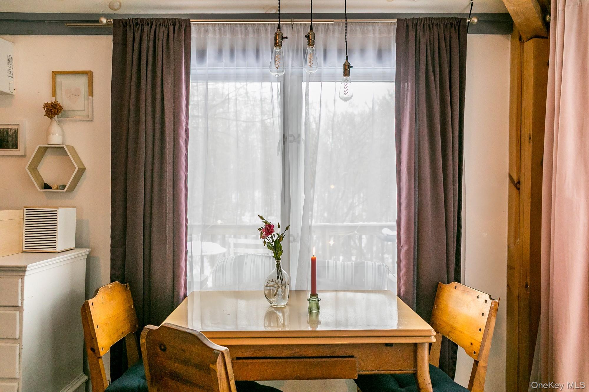 165 High Falls Road Extension Catskill, NY 12414 - Photo 23 of 28 a view of a dining room with furniture and window