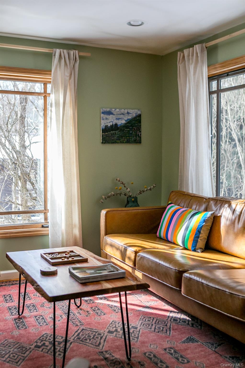 165 High Falls Road Extension Catskill, NY 12414 - Photo 5 of 28 a living room with a couch and a table