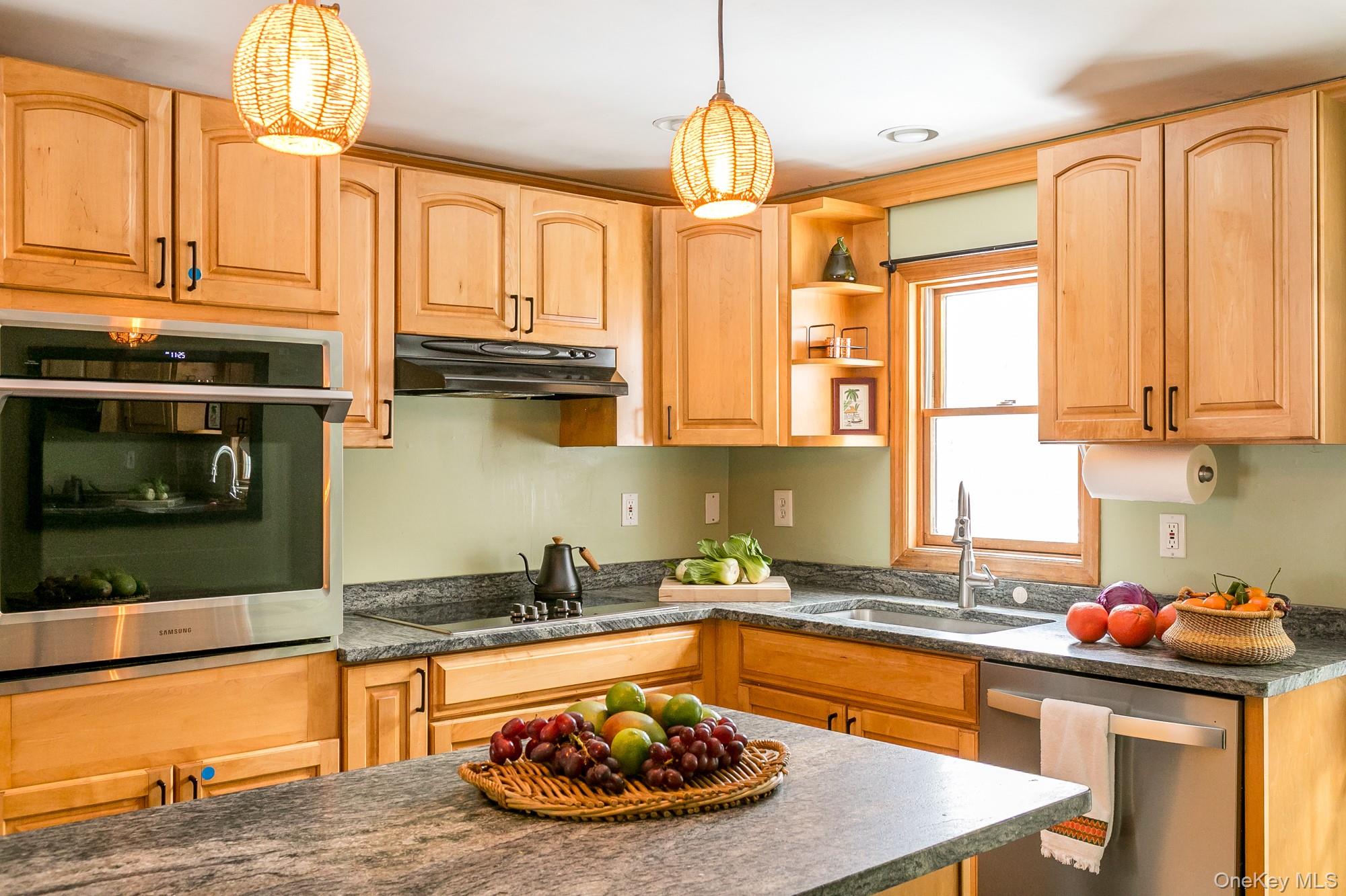 165 High Falls Road Extension Catskill, NY 12414 - Photo 8 of 28 a kitchen with stainless steel appliances granite countertop a sink window and cabinets