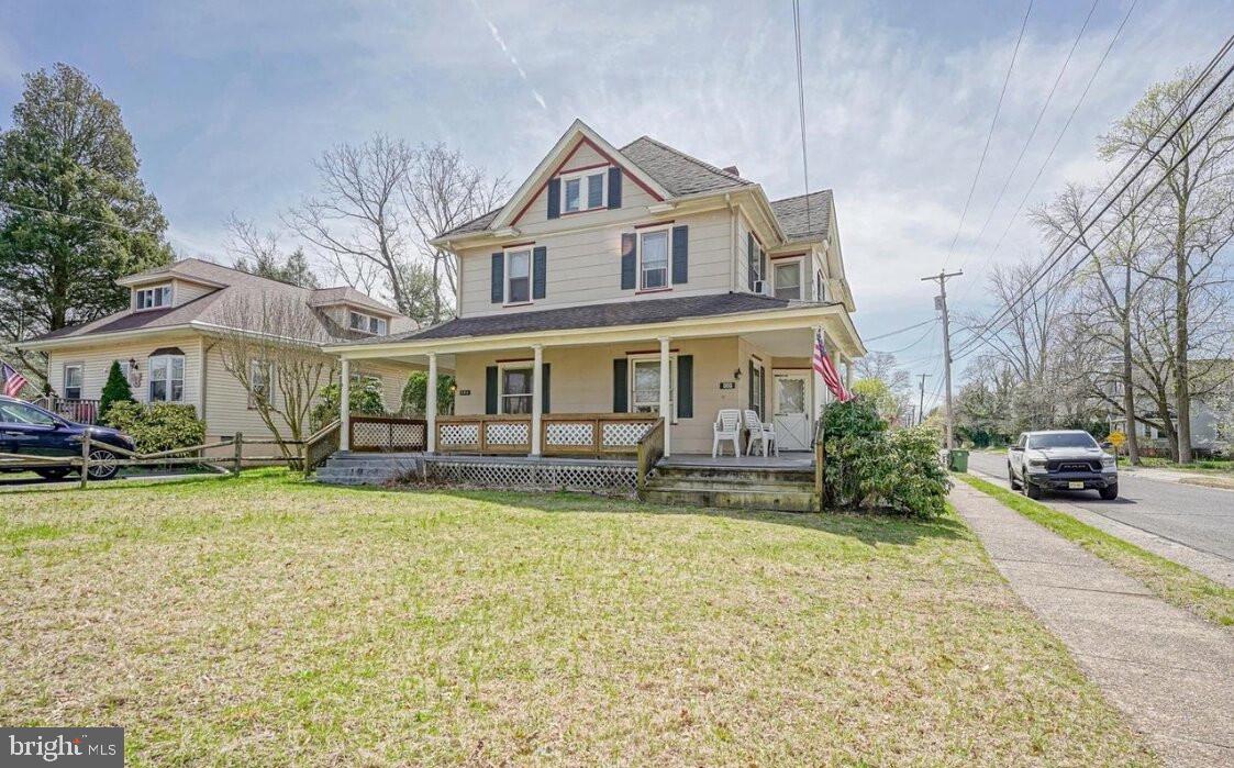 202 Cedar Avenue Pitman, NJ 08071 - Photo 1 of 11 a front view of a house with swimming pool