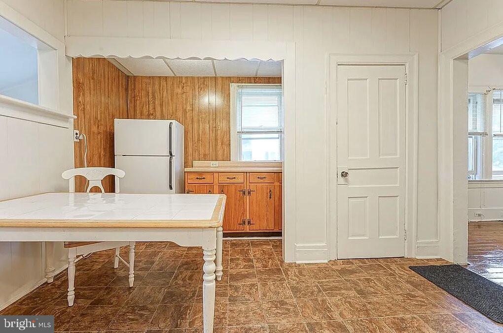 202 Cedar Avenue Pitman, NJ 08071 - Photo 4 of 11 a kitchen with a sink cabinets and a refrigerator
