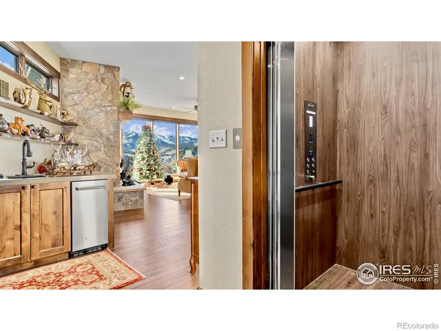 a open living room with a couch and cabinets