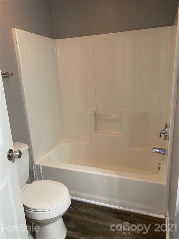 905 Lakehill Road Charlotte, NC 28214 - Photo 15 of 22 a bathroom with a sink and a toilet