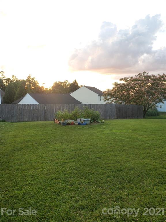 905 Lakehill Road Charlotte, NC 28214 - Photo 19 of 22 a view of an outdoor space and a yard