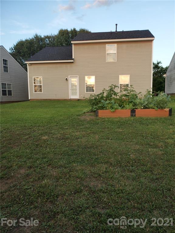 905 Lakehill Road Charlotte, NC 28214 - Photo 20 of 22 a view of a backyard of the house