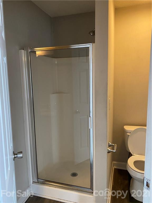 905 Lakehill Road Charlotte, NC 28214 - Photo 10 of 22 a bathroom with a shower and a toilet