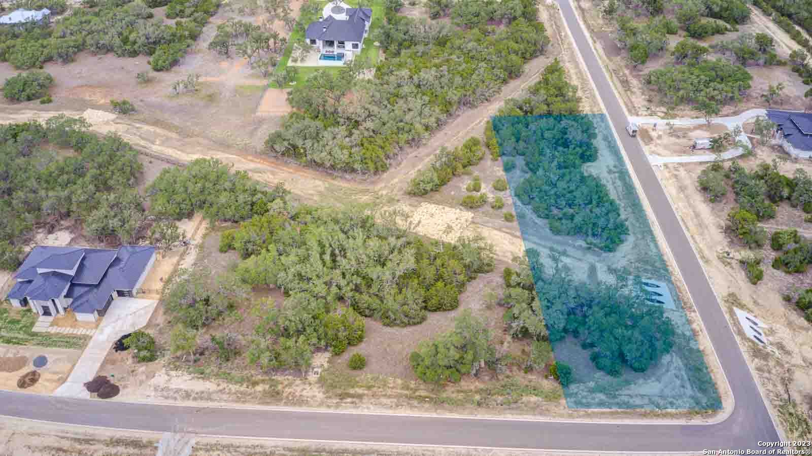 704 Sharp Spgs Road Bulverde, TX 78163 - Photo 2 of 9 an aerial view of a yard