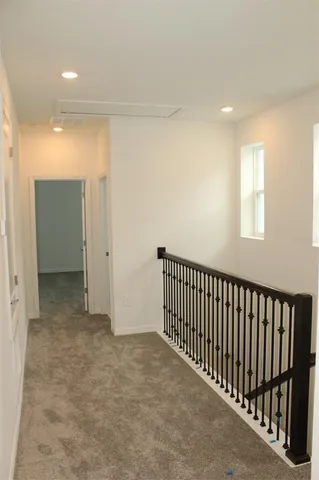 a view of a hallway with entryway