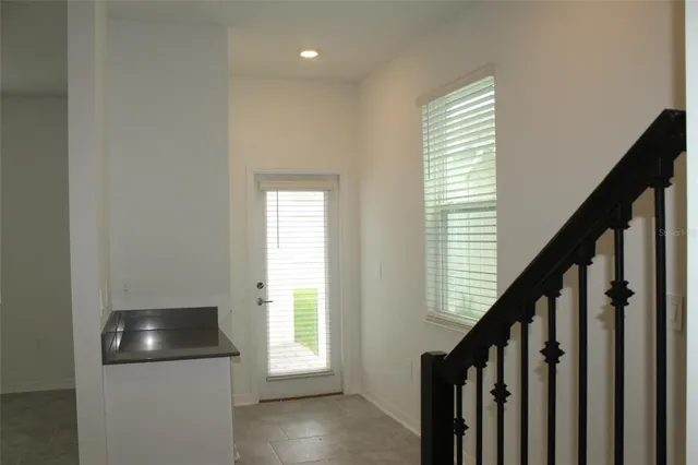 a kitchen with a window and washer