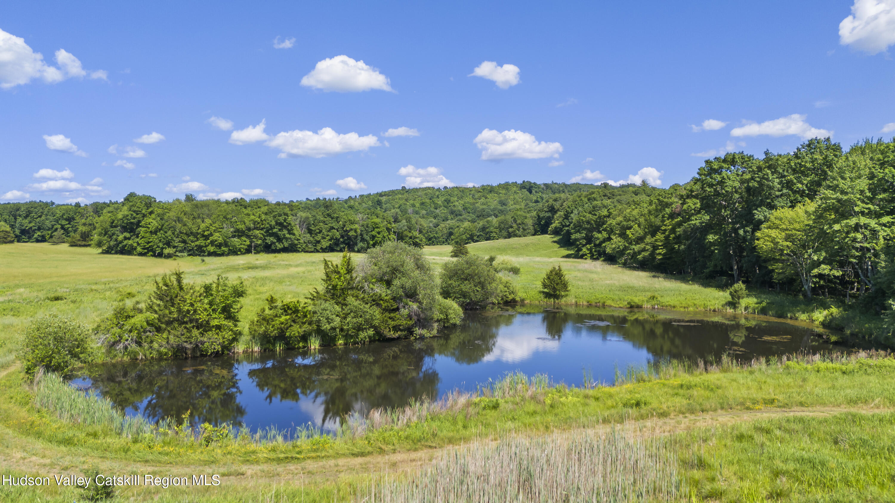 0 Lockwood Road Hudson, NY 12534 - Photo 9 of 11 a view of a lake with houses in the back