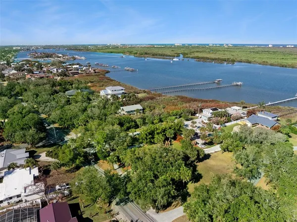 a view of an ocean and a city