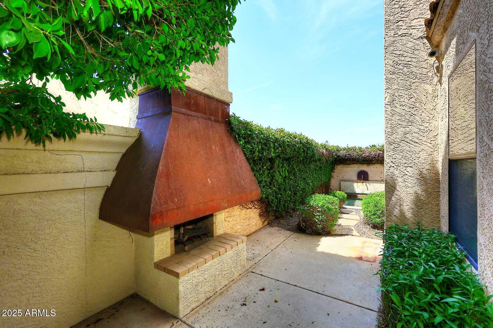 8100 East Camelback Road, Unit 39 Scottsdale, AZ 85251 - Photo 39 of 71 Courtyard-Fireplace