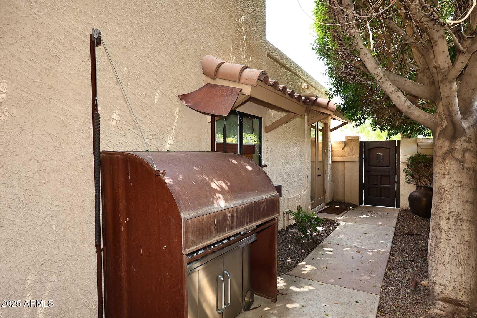 8100 East Camelback Road, Unit 39 Scottsdale, AZ 85251 - Photo 41 of 71 Courtyard-BBQ Cover