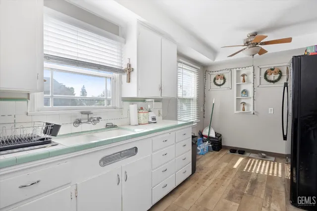 a kitchen with a sink and a window
