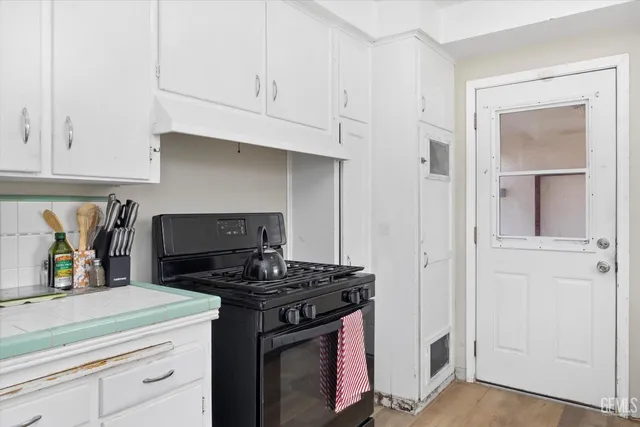 a view of a hallway with closet and a livingroom view