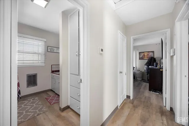 a white bath tub sitting next to a white sink