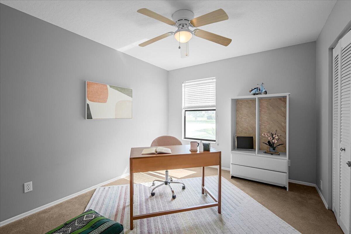 1901 Jacques Drive Melbourne, FL 32940 - Photo 28 of 43 a living room with furniture and a window