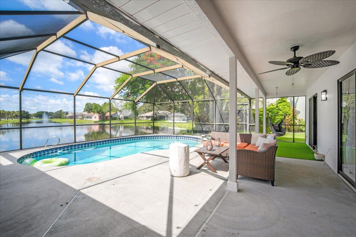 1901 Jacques Drive Melbourne, FL 32940 - Photo 39 of 43 a view of a patio with a table and chairs