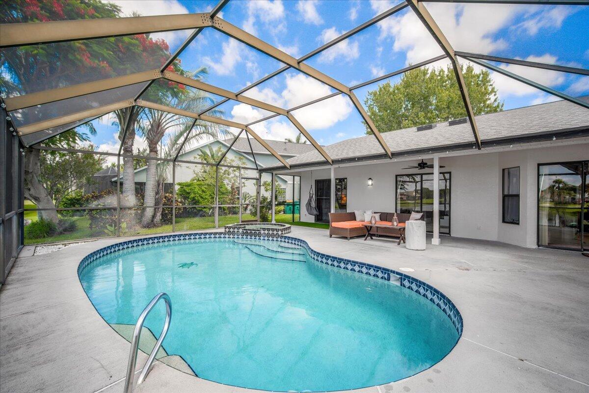 1901 Jacques Drive Melbourne, FL 32940 - Photo 41 of 43 a indoor swimming pool with barbeque oven in front of it