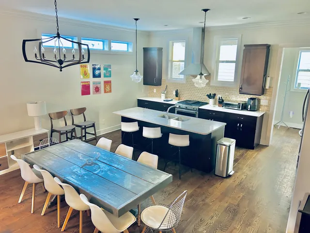a kitchen with cabinets and stainless steel appliances