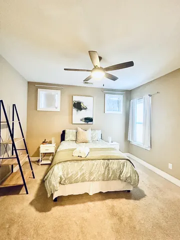 a bathroom with a shower and a bath tub