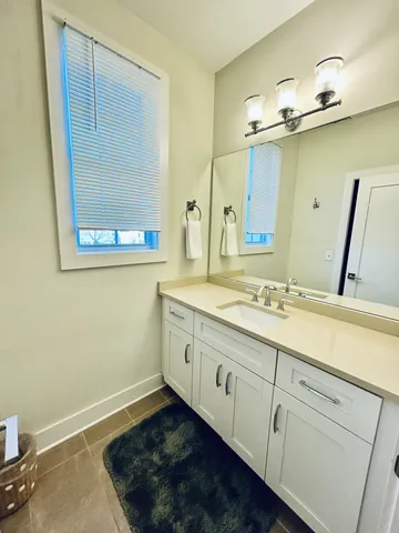 a bathroom with a toilet and a sink