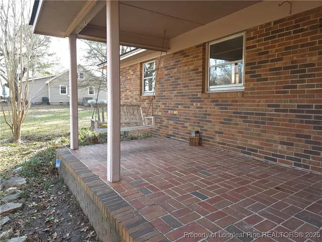 a view of a house with a swimming pool