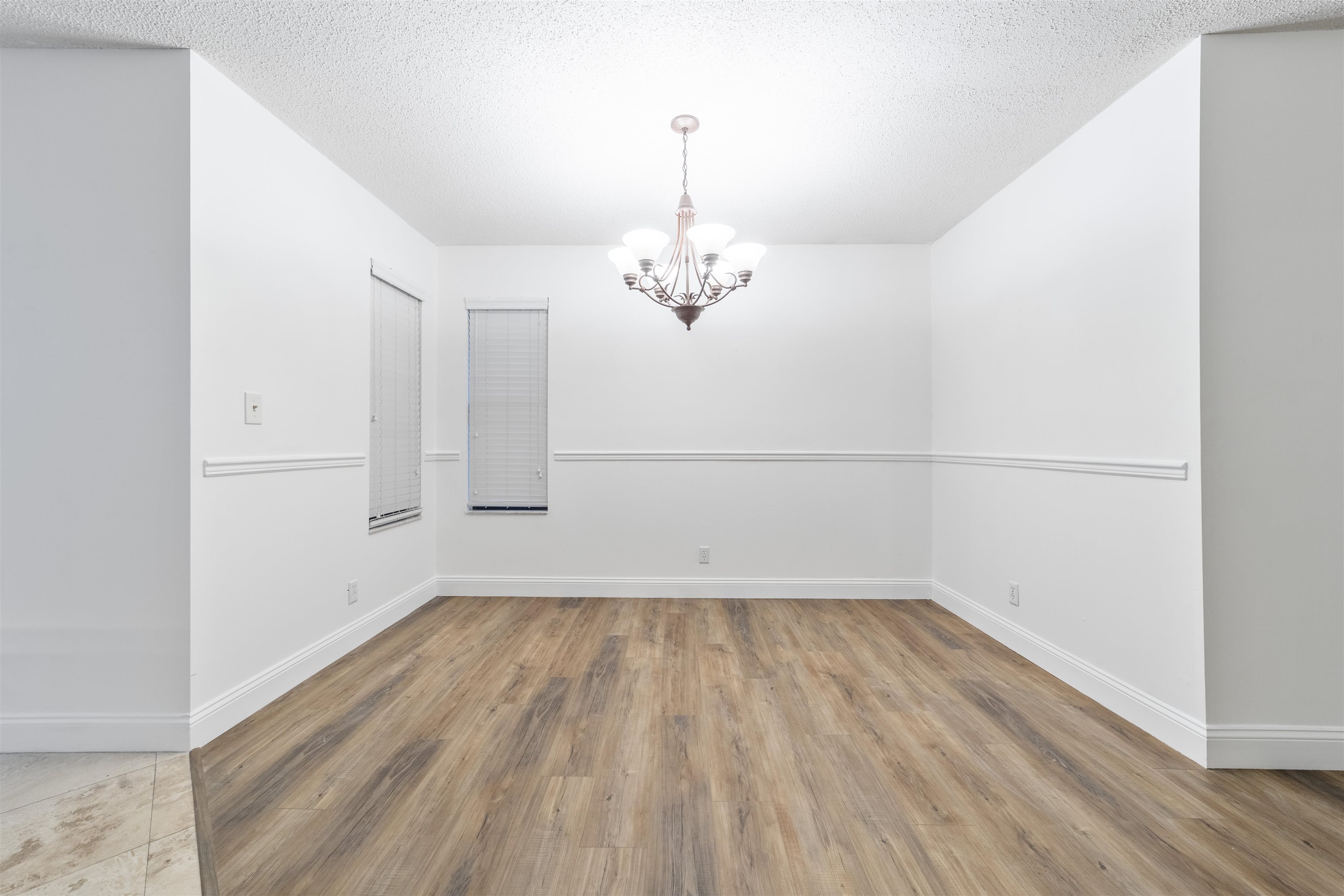 111 Lobelia Road St. Augustine, FL 32086 - Photo 13 of 46 a view of a room with wooden floor and a window