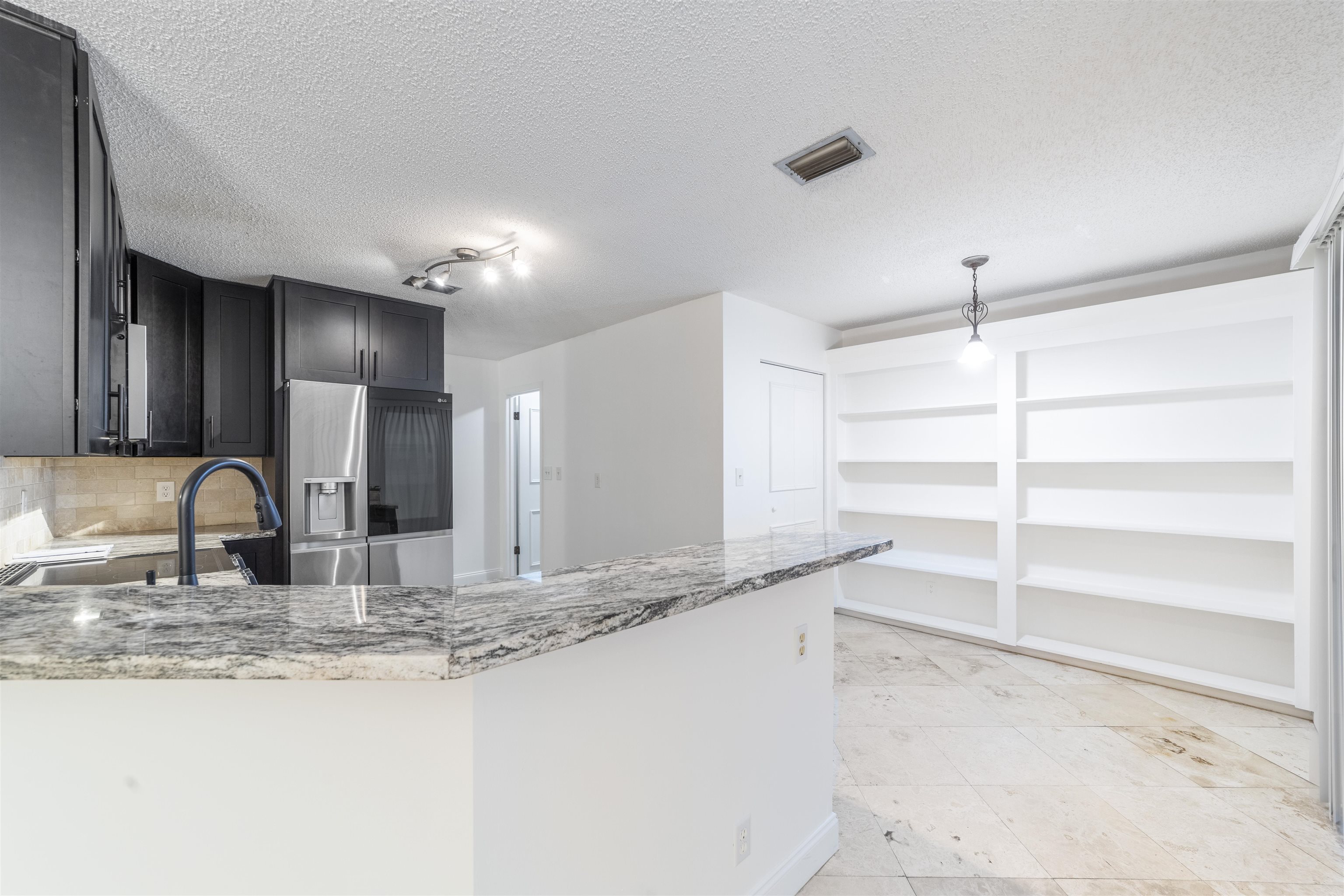 111 Lobelia Road St. Augustine, FL 32086 - Photo 21 of 46 a view of a kitchen with a sink