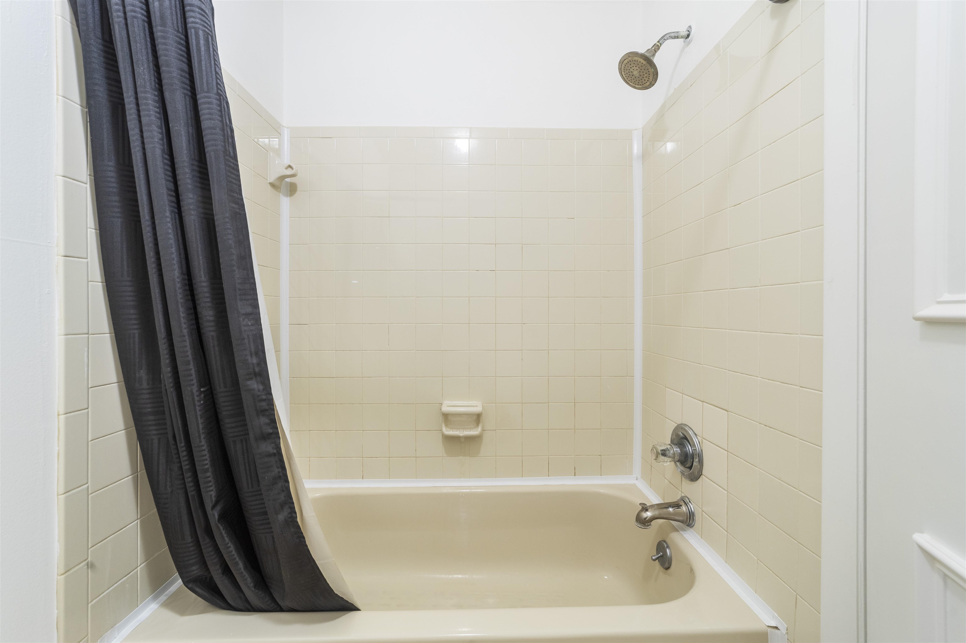 111 Lobelia Road St. Augustine, FL 32086 - Photo 31 of 46 a bathroom with a bathtub and a shower