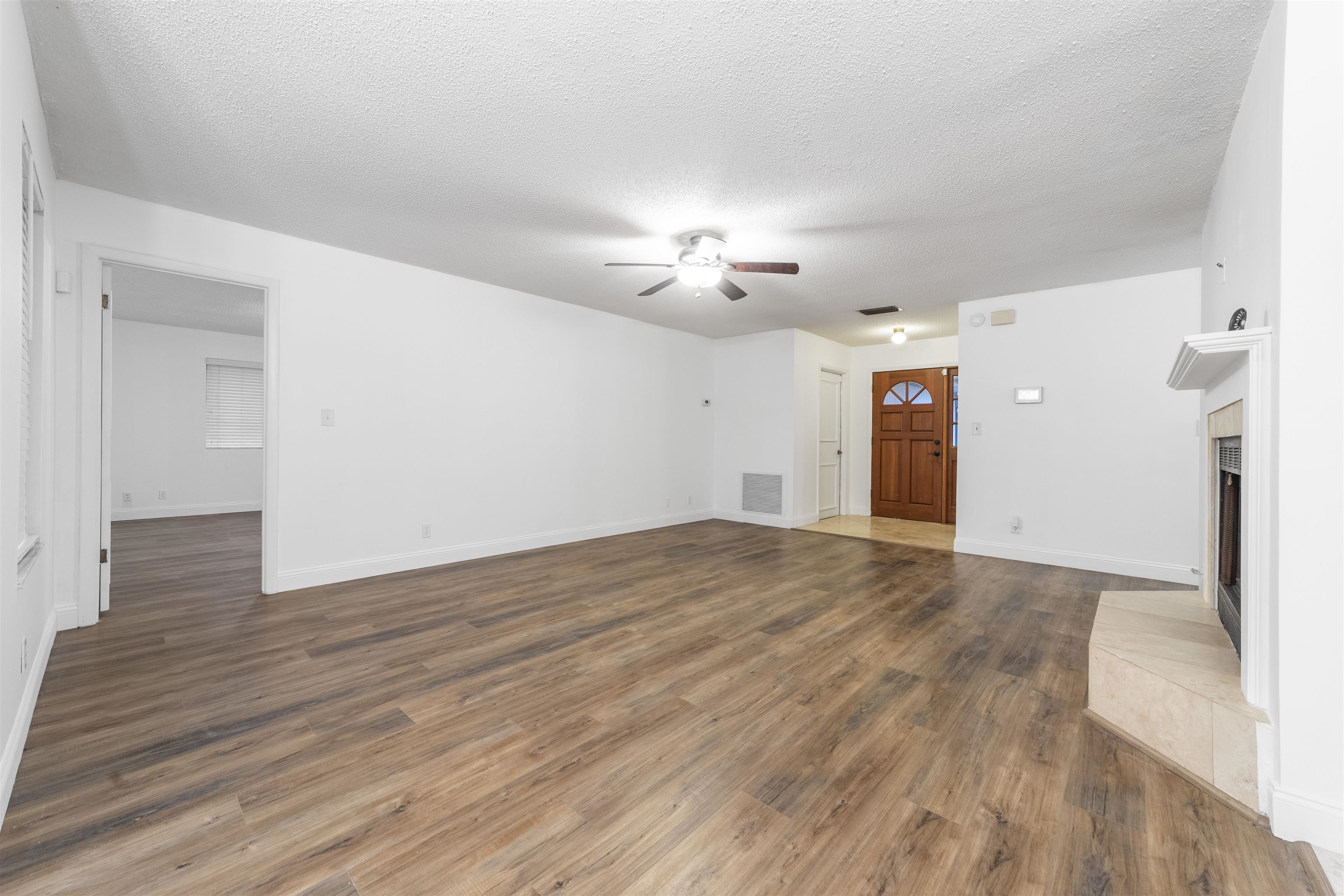 111 Lobelia Road St. Augustine, FL 32086 - Photo 7 of 46 a view of empty room with wooden floor